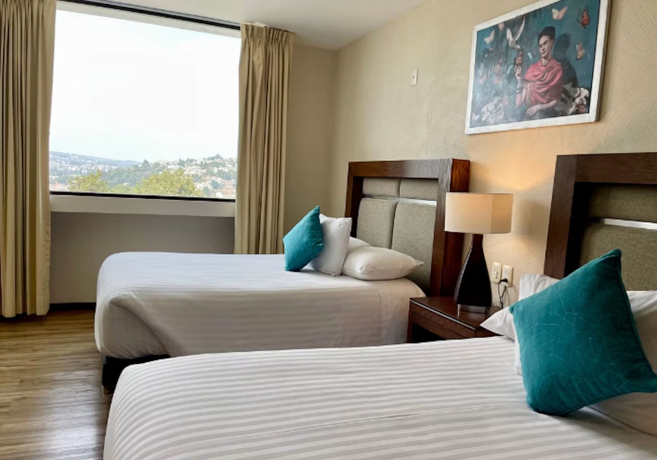 Habitación Doble del Hotel Mirante, con dos camas matrimoniales